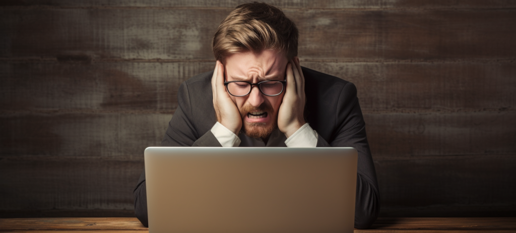 An image of a frustrated man doing SEO for his MSP