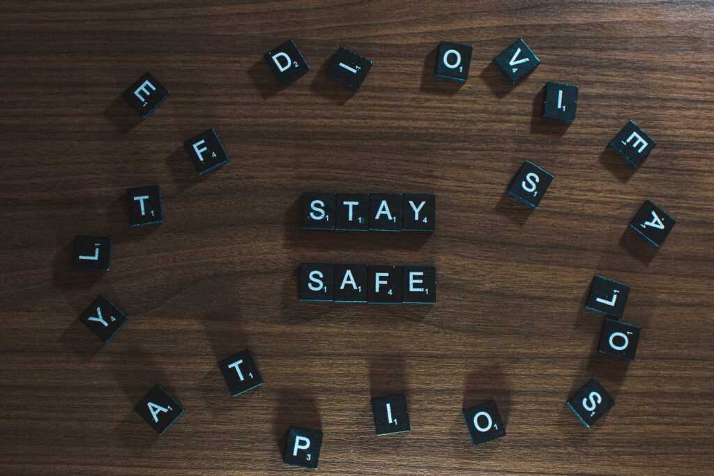 A photo of blocks with letters on them, usually used for the word-game Scramble, spelling out "Stay Safe".